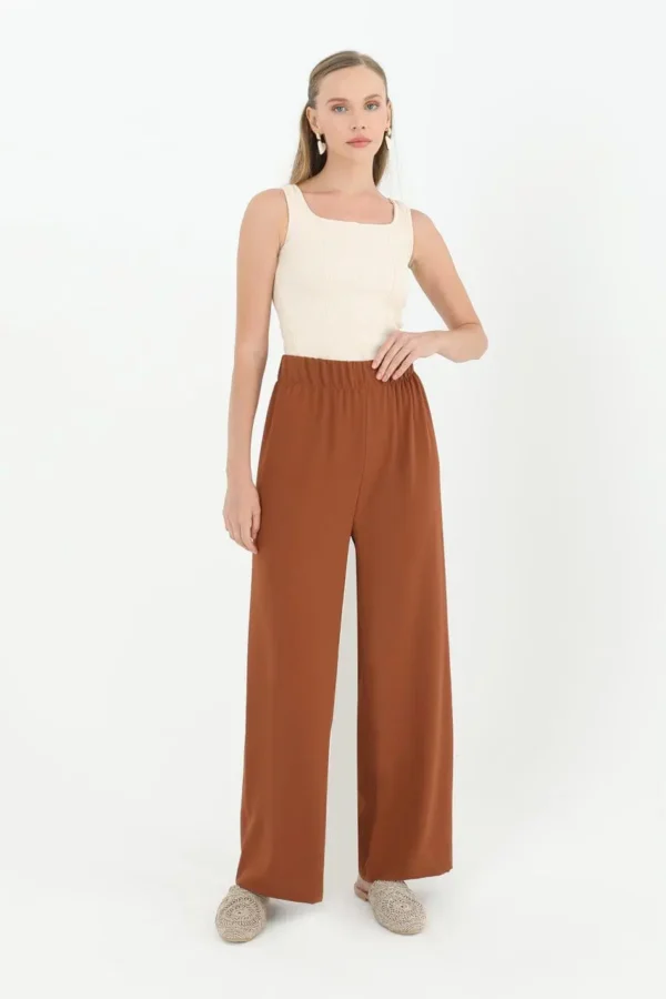 Pantalon large, élastique , couleur marron ou blanc ou beige nude